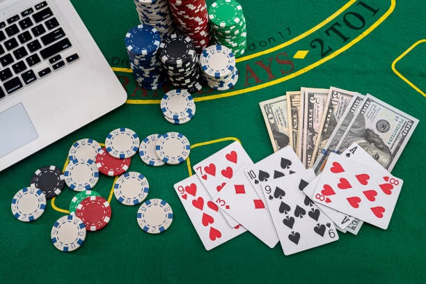 Settlement screen showing Player and Banker hands with winning hand highlighted and payout displayed